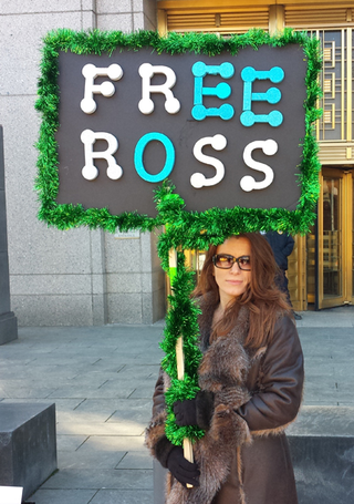 <h2>Free Ross</h2>
Michele Seven outside Federal District Court in Manhattan, January 2015.
<p>Source:&nbsp;<a href="https://insidebitcoins.com/news/ross-ulbricht-on-trial-protestors-defend-silk-road/28769">insidebitcoins.com</a></p>